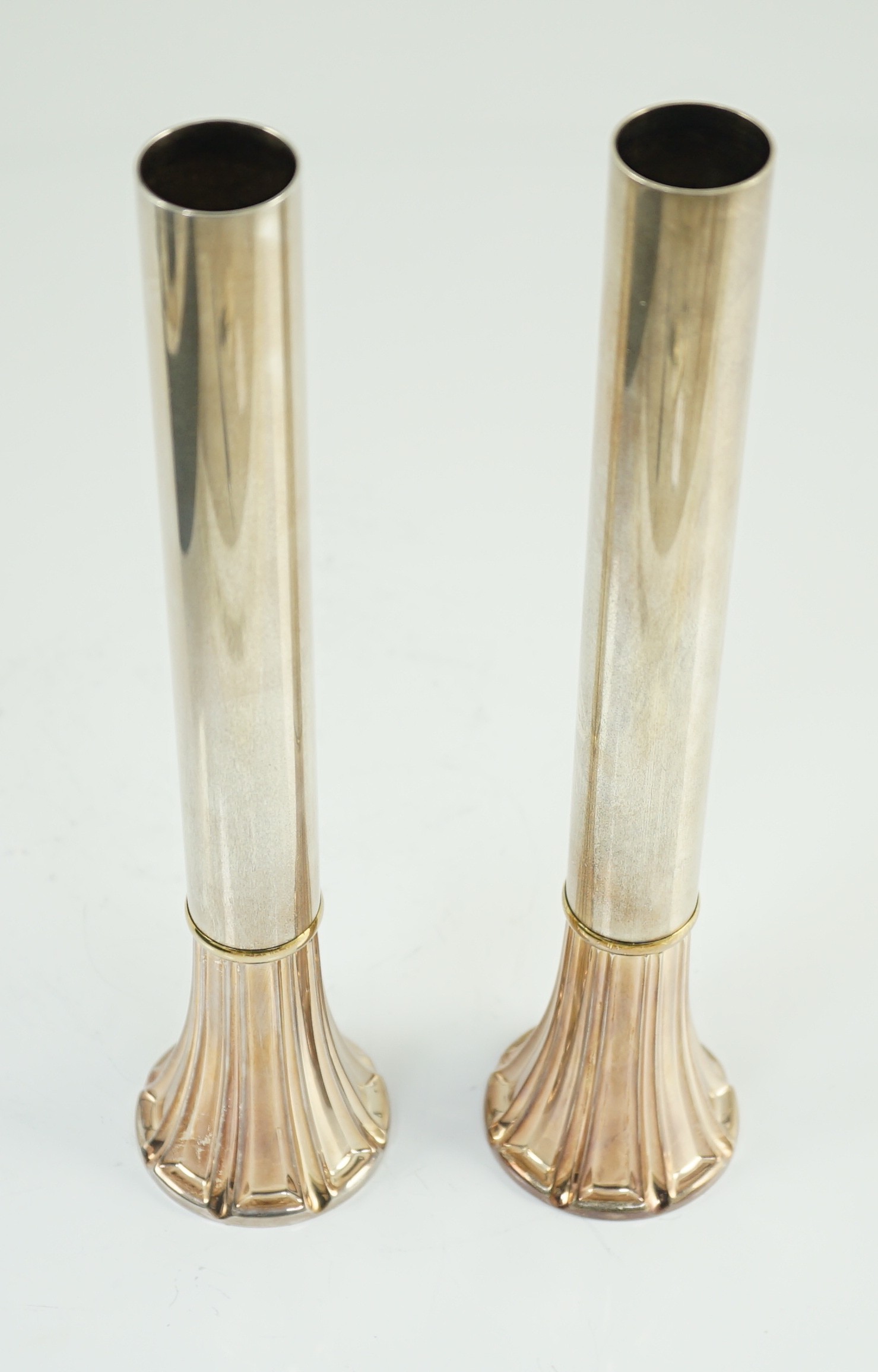 A modern pair of French parcel gilt 925 silver cylindrical flower holders, by Tabbah, Paris